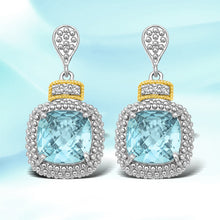 Load image into Gallery viewer, 18k Yellow Gold & Sterling Silver Sky Blue Topaz & Diamond Earrings (.05cttw)