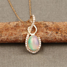 Load image into Gallery viewer, 0.56 Carat Genuine Ethiopian Opal and White Diamond 14K Yellow Gold Pendant