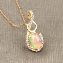 Load image into Gallery viewer, 0.56 Carat Genuine Ethiopian Opal and White Diamond 14K Yellow Gold Pendant
