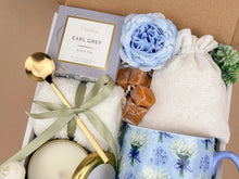 Load image into Gallery viewer, Comfort Gift Box – Cozy Mug and Socks Gift with Tea, Candle &amp; Caramel Treats
