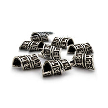 Load image into Gallery viewer, Silver beads with intricate designs on a white background for beard and hair earrings
