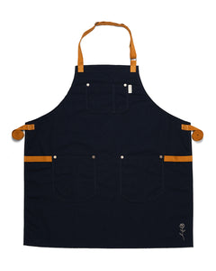 Black chefs apron with brown leather straps on a white background