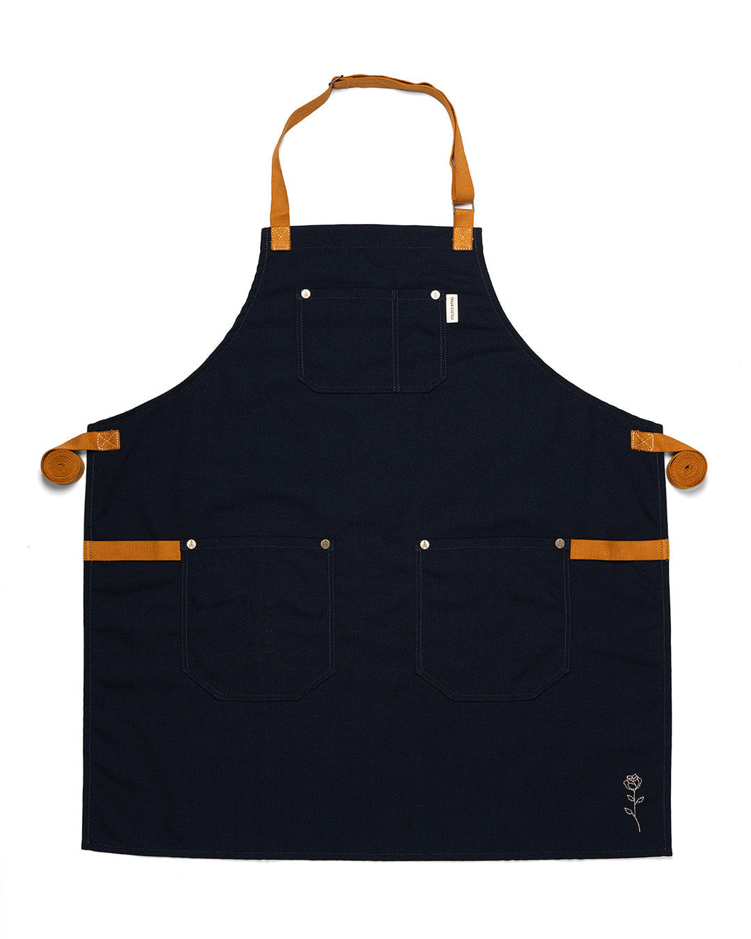 Black chefs apron with brown leather straps on a white background