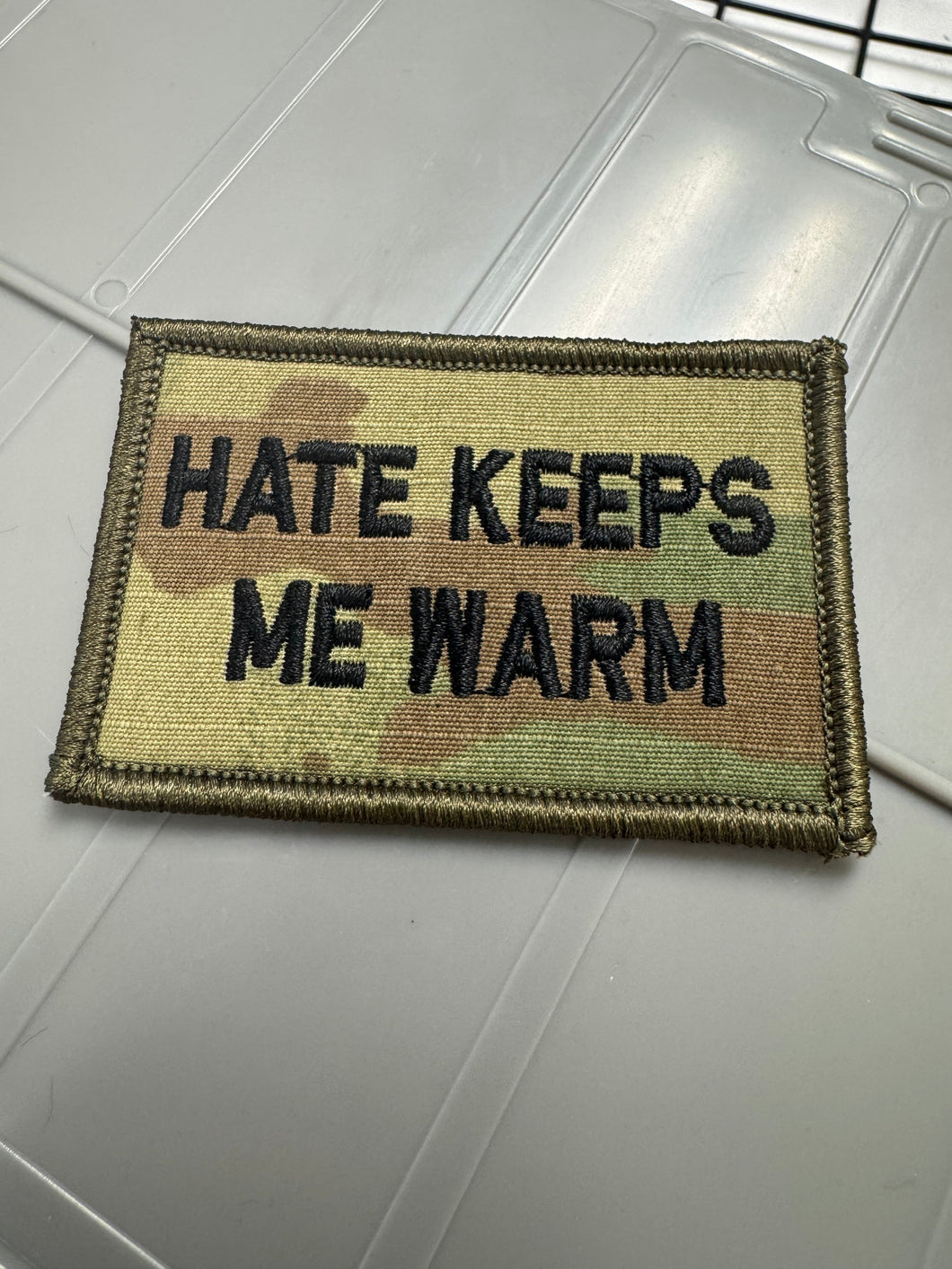 As Seen on Socials - Hate Keeps Me Warm - 2x3 Patch - Multicam w/Black