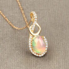 Load image into Gallery viewer, 0.56 Carat Genuine Ethiopian Opal and White Diamond 14K Yellow Gold Pendant
